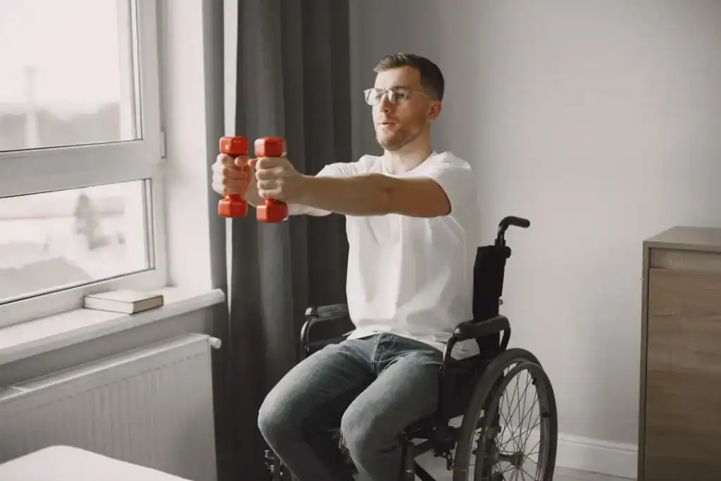 Empowering Weight Loss: A Comprehensive Guide for Individuals with Disabilities 1 Image of man doing exercise in his wheelchair to aid weight loss Leighton Buzzard